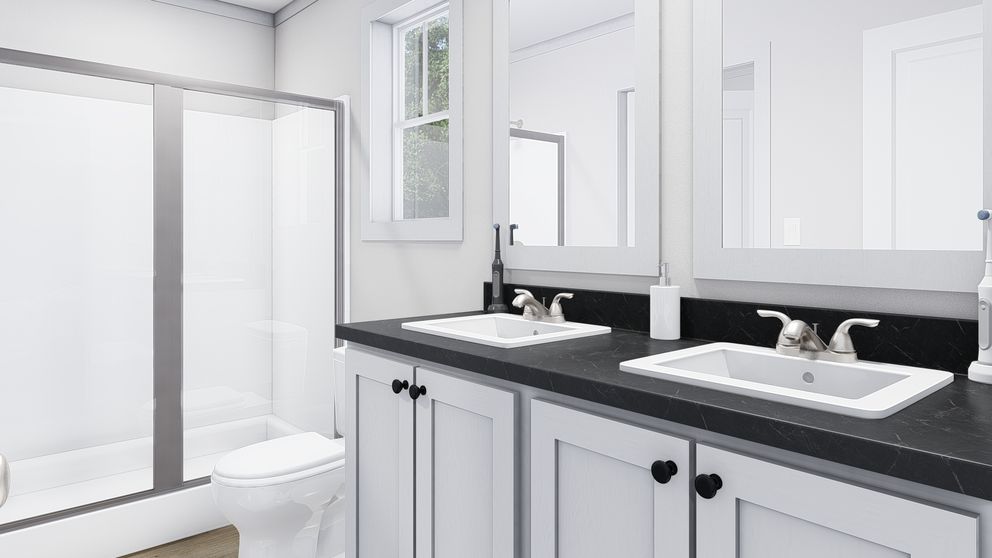The RISING SUN Primary Bathroom. This Manufactured Mobile Home features 2 bedrooms and 2 baths.