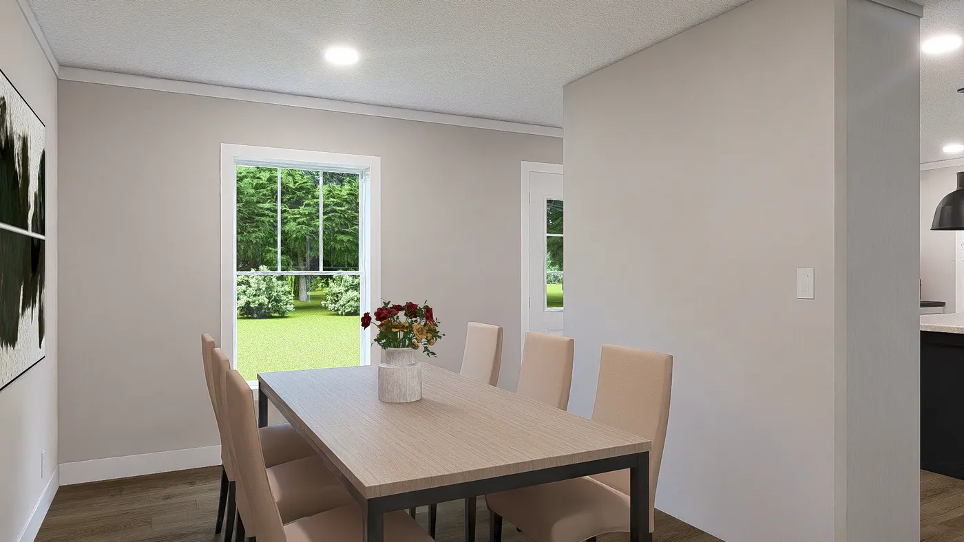 The SHOUT Dining Area. This Manufactured Mobile Home features 3 bedrooms and 2 baths.