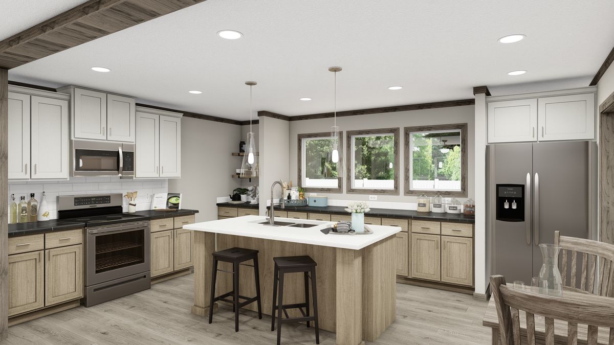 The THE MADISON Kitchen. This Manufactured Mobile Home features 3 bedrooms and 2 baths.
