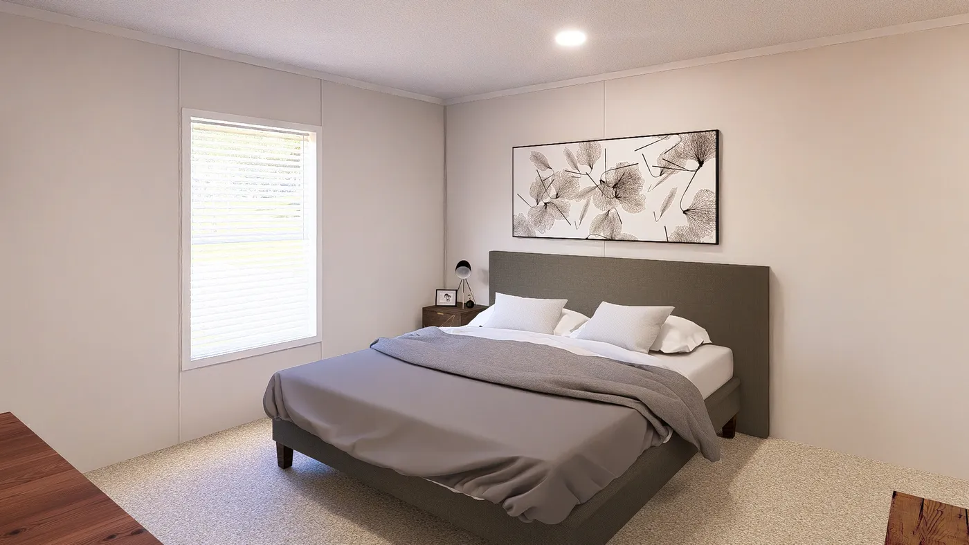 The GARNET Primary Bedroom. This Manufactured Mobile Home features 3 bedrooms and 2 baths.