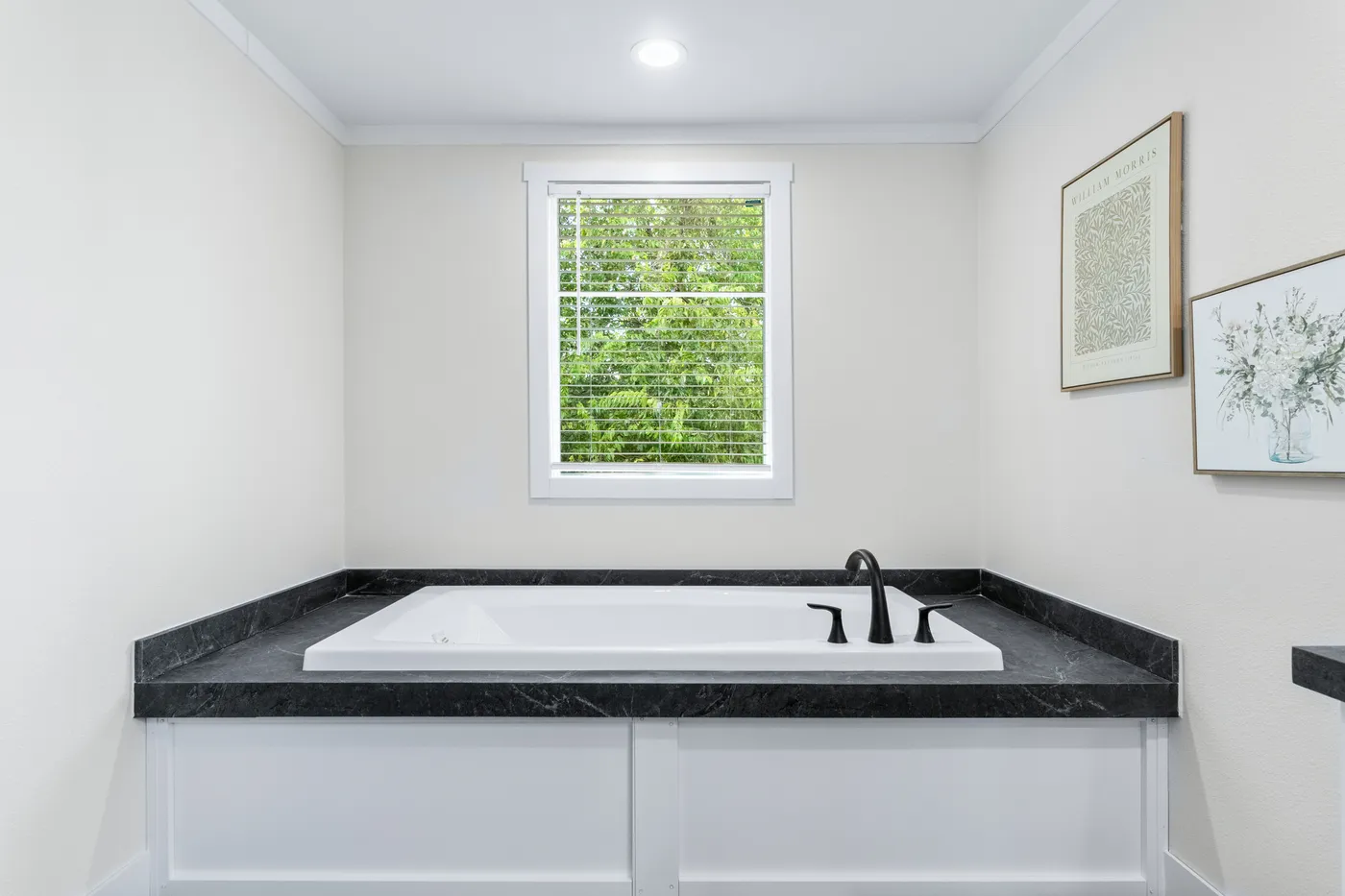 The SAWYER ELITE Primary Bathroom. This Manufactured Mobile Home features 3 bedrooms and 2 baths.