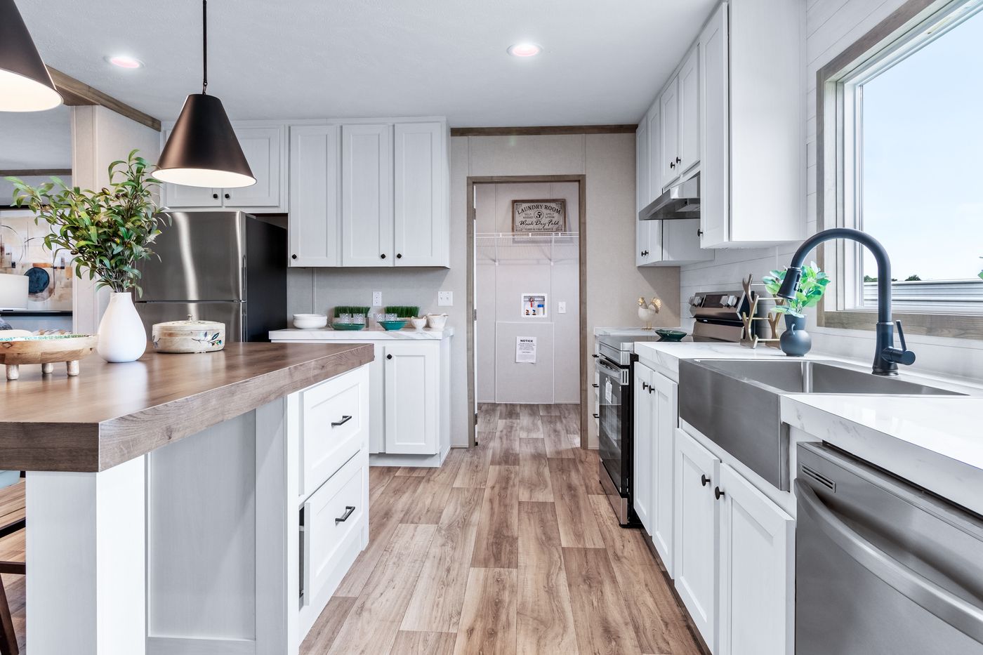 The THE CHOICE Kitchen. This Manufactured Mobile Home features 4 bedrooms and 2 baths.