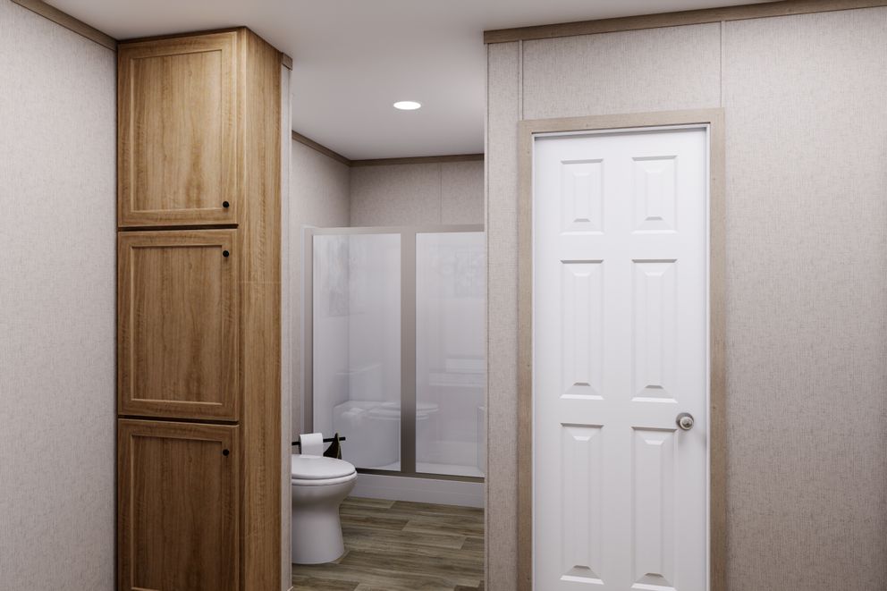 The TRADITION 3260 Primary Bathroom. This Manufactured Mobile Home features 3 bedrooms and 2 baths.