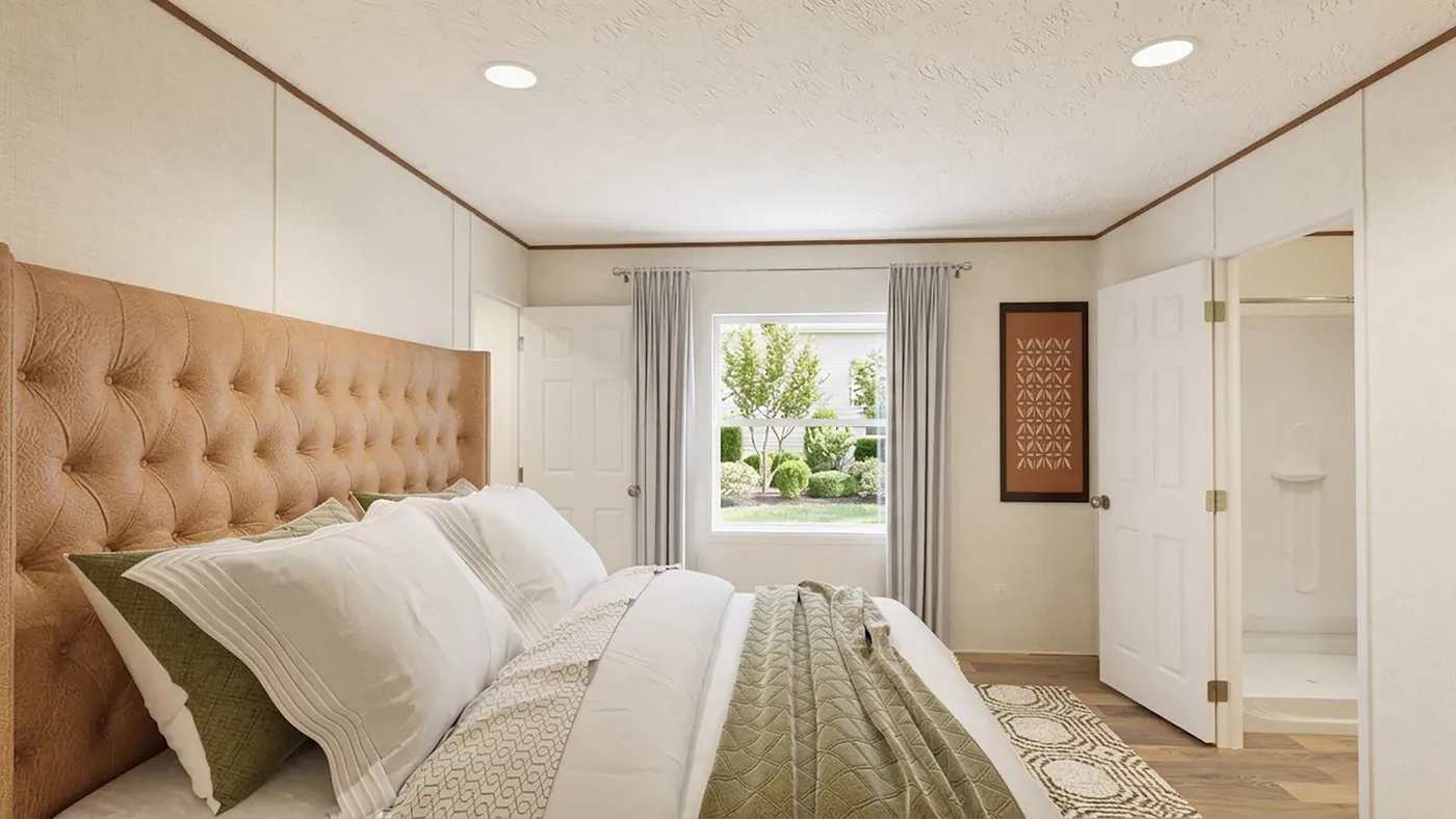 The ASPEN Primary Bedroom. This Manufactured Mobile Home features 3 bedrooms and 2 baths.