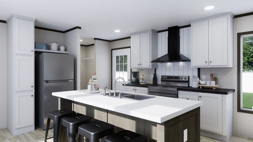 The THE SPARK Kitchen. This Manufactured Mobile Home features 3 bedrooms and 2 baths.