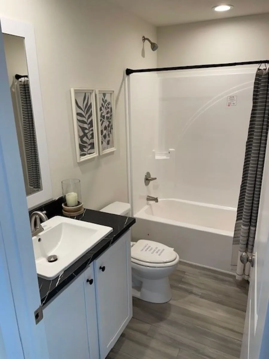 The BUTLER PLACE/6428-MS056 SECT Guest Bathroom. This Manufactured Mobile Home features 3 bedrooms and 3 baths.