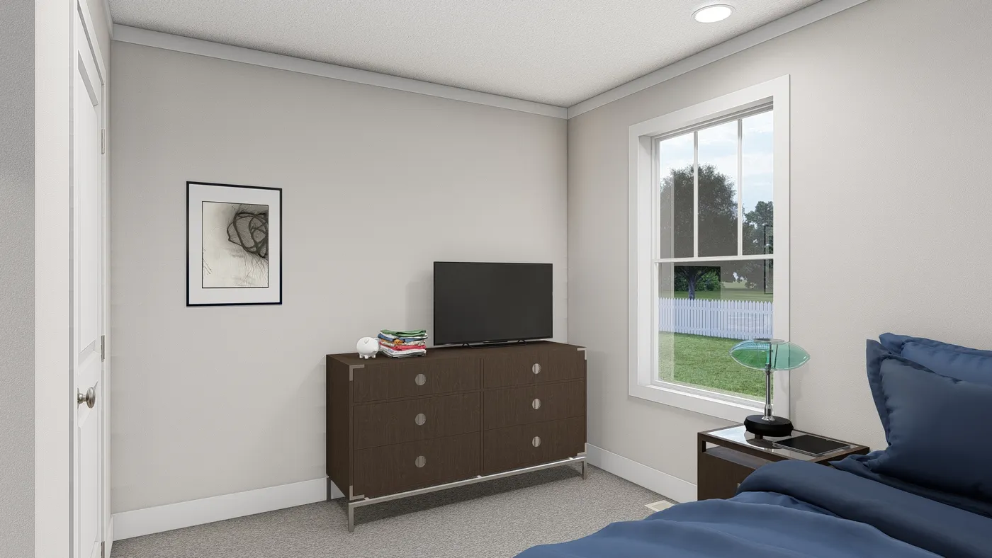 The THREE LITTLE BIRDS Guest Bedroom. This Manufactured Mobile Home features 3 bedrooms and 2 baths.