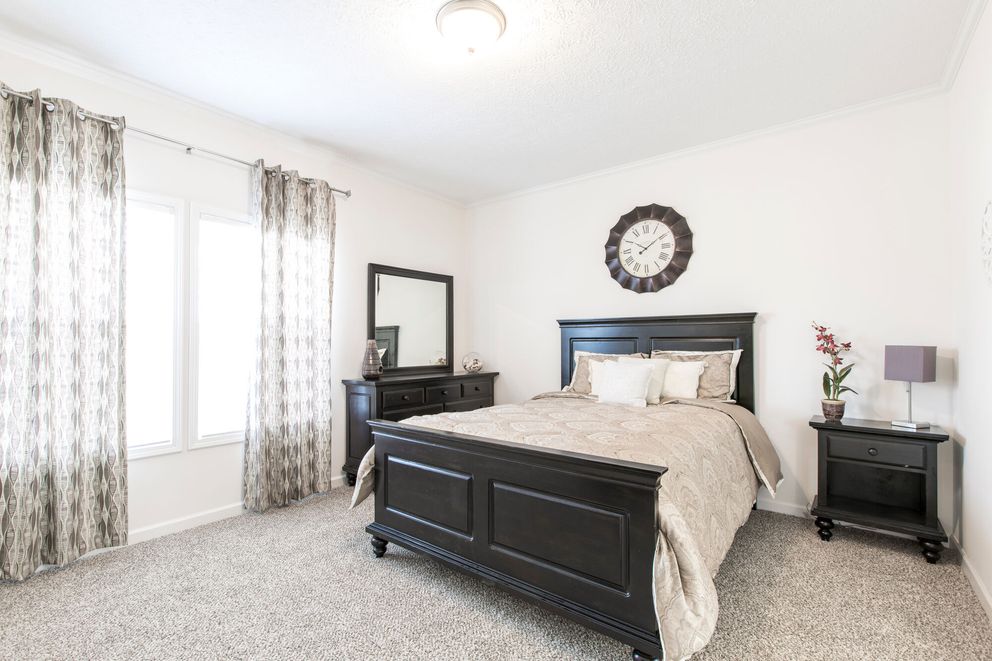 The 1558 JAMESTOWN Primary Bedroom. This Manufactured Mobile Home features 3 bedrooms and 2 baths.