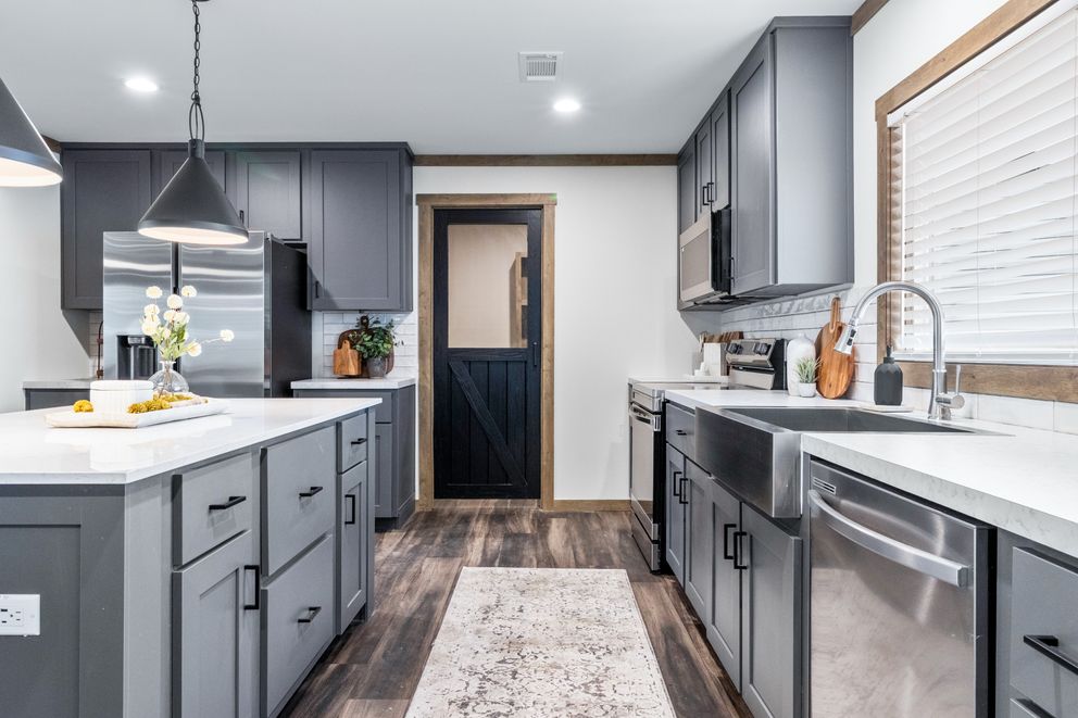 The EVERETT ELITE Kitchen. This Manufactured Mobile Home features 4 bedrooms and 3 baths.