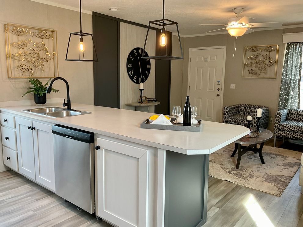 The PERIDOT 66 Kitchen with living room view.