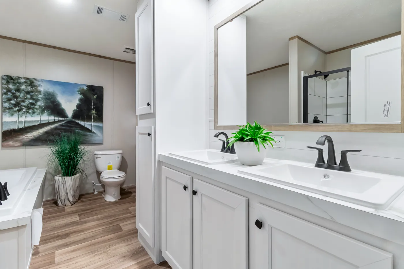 The THE CHOICE Primary Bathroom. This Manufactured Mobile Home features 4 bedrooms and 2 baths.