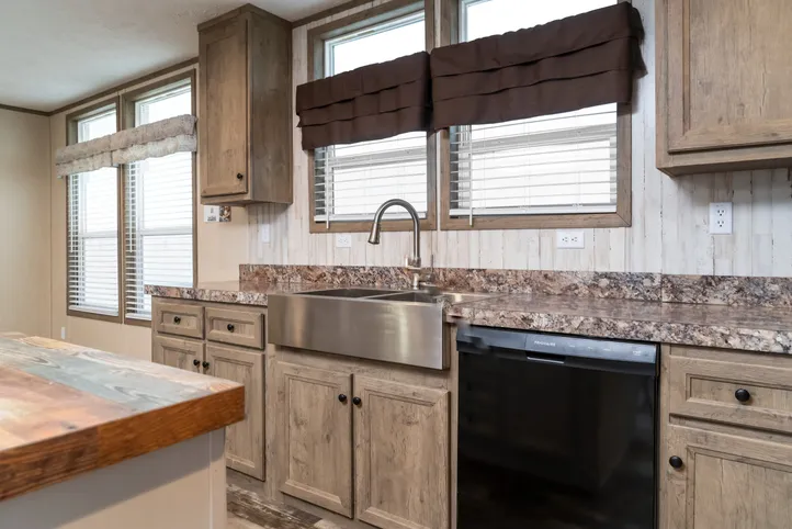 The NUMBER ONE Exterior. This Manufactured Mobile Home features 3 bedrooms and 2 baths.