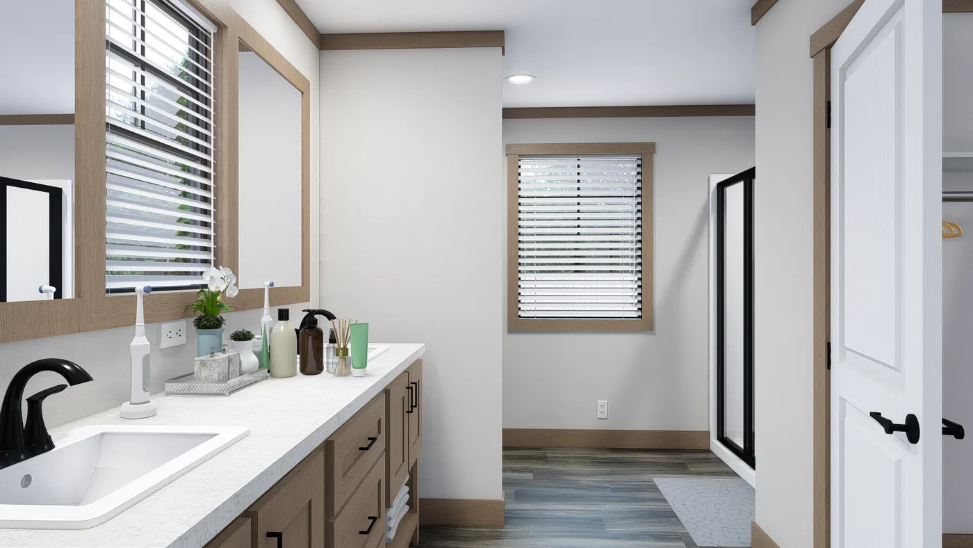 The WILDER Primary Bathroom. This Manufactured Mobile Home features 3 bedrooms and 2 baths.