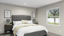 The LEGEND 28X48 Primary Bedroom. This Manufactured Mobile Home features 3 bedrooms and 2 baths.