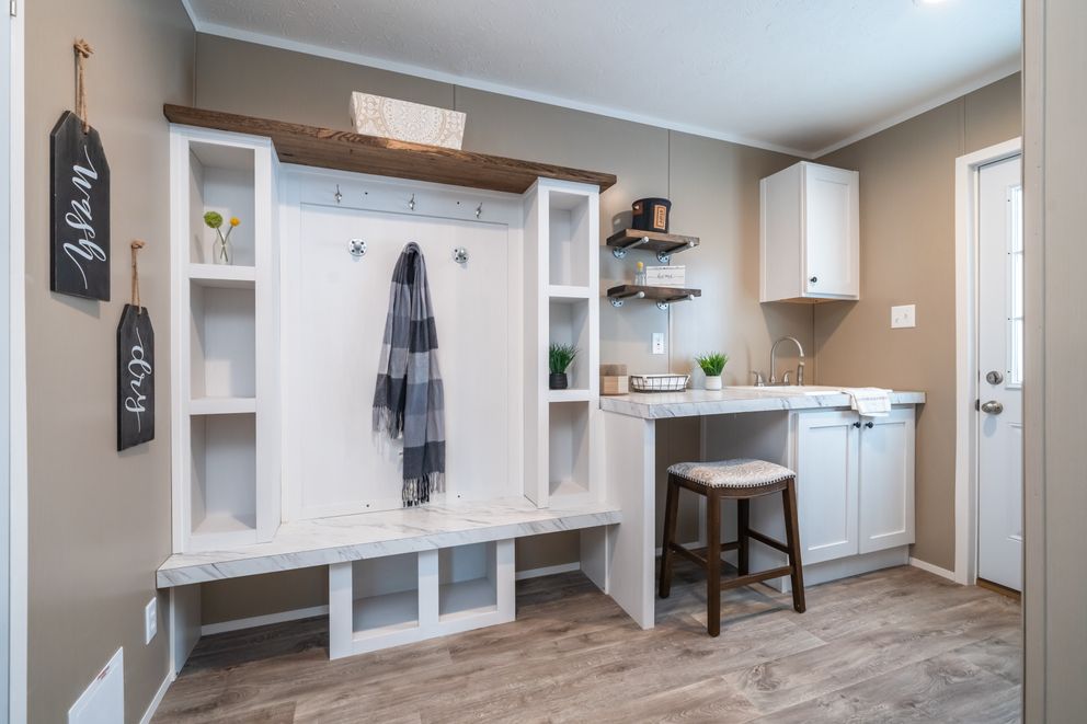 The THE RESERVE 60 Utility Room. This Manufactured Mobile Home features 3 bedrooms and 2 baths.