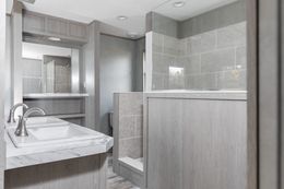 The SHOWER HOUSE Master Bathroom. This Manufactured Mobile Home features 3 bedrooms and 2 baths.
