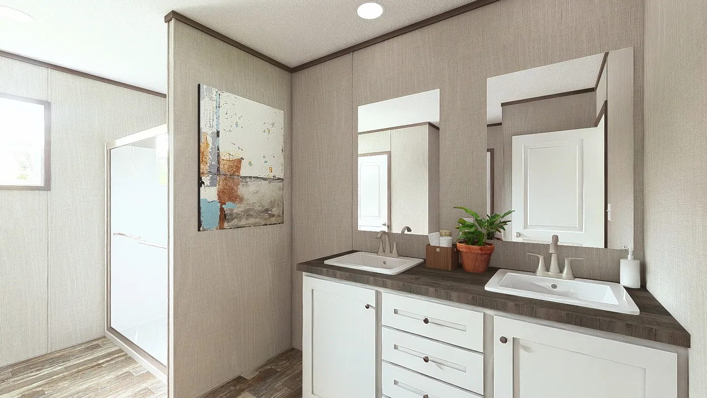 The ULTRA BREEZE 28X52 Primary Bathroom. This Manufactured Mobile Home features 3 bedrooms and 2 baths.