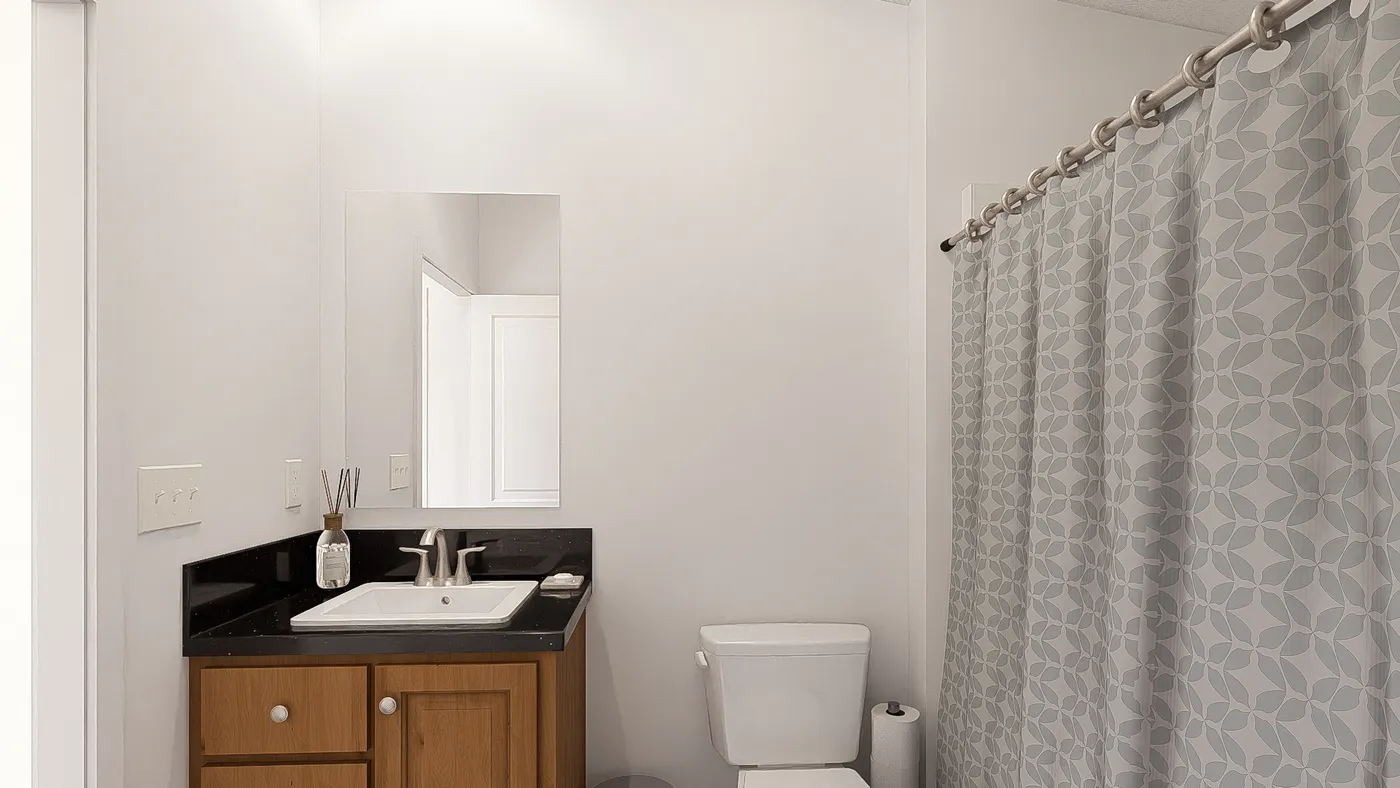 The DRM601M 60'              DREAM Guest Bathroom. This Manufactured Mobile Home features 1 bedroom and 2 baths.