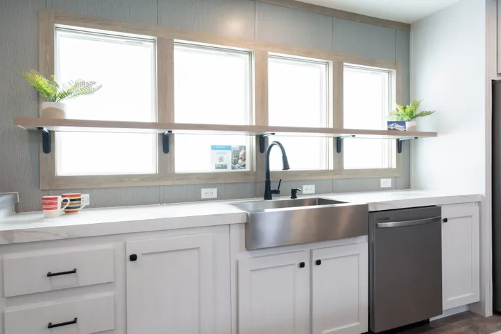 The BLUEBONNET BREEZE Kitchen. This Manufactured Mobile Home features 3 bedrooms and 2 baths.