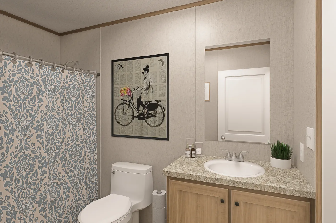 The THE EAGLE 52 Guest Bathroom. This Manufactured Mobile Home features 3 bedrooms and 2 baths.