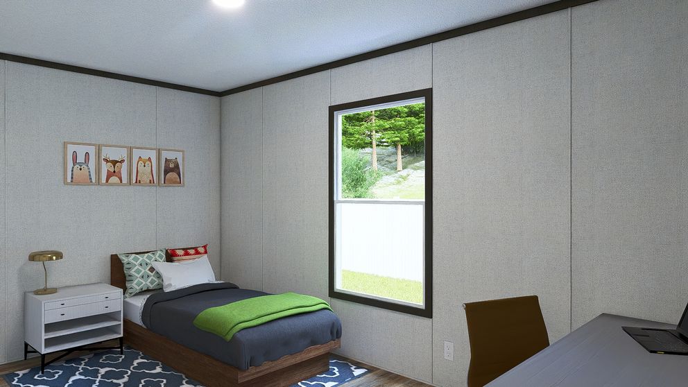 The DYNAMIC Bedroom. This Manufactured Mobile Home features 3 bedrooms and 2 baths.