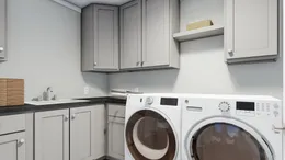 The CASTLE PINES Utility Room. This Manufactured Mobile Home features 3 bedrooms and 2 baths.