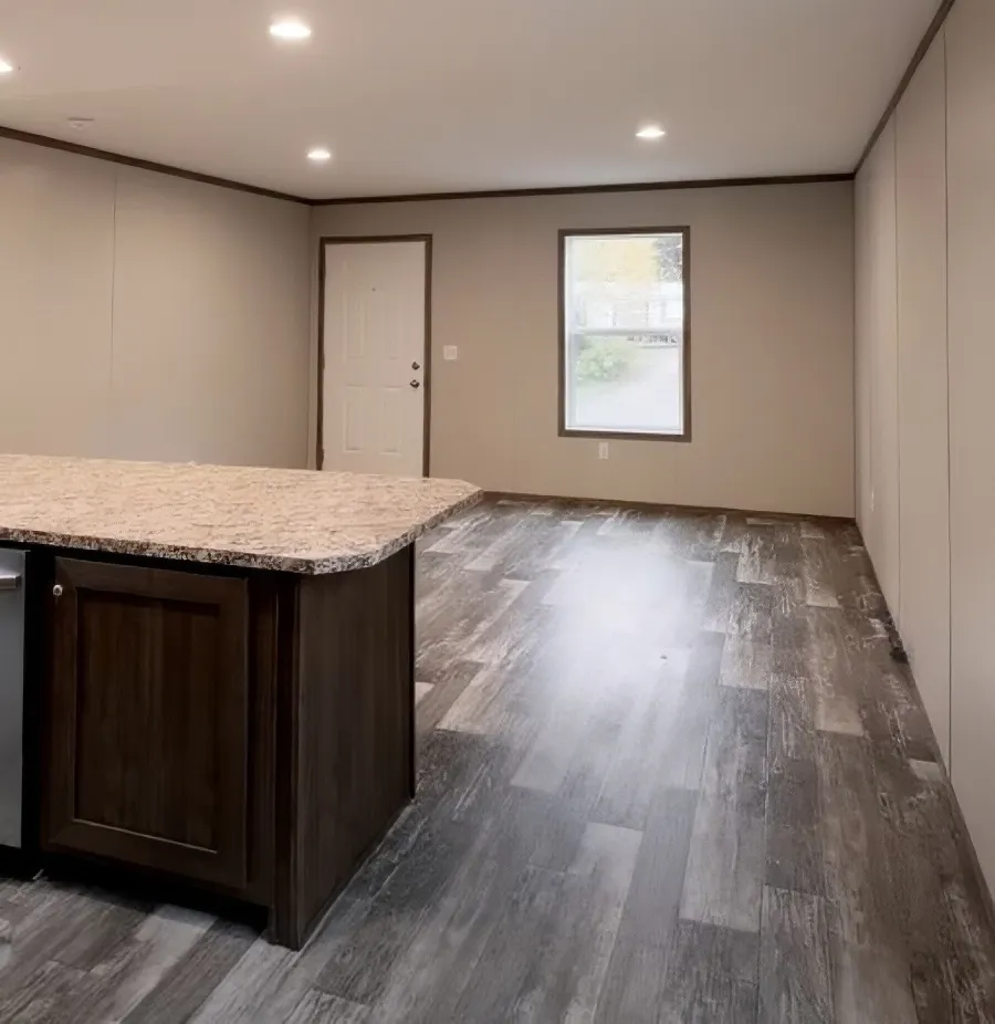 The PERIDOT Living Room. This Manufactured Mobile Home features 2 bedrooms and 1 bath.