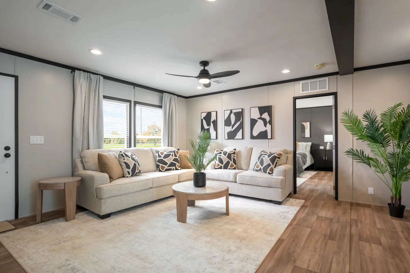 The THE ANNIVERSARY 2.1 Living Room. This Manufactured Mobile Home features 3 bedrooms and 2 baths.
