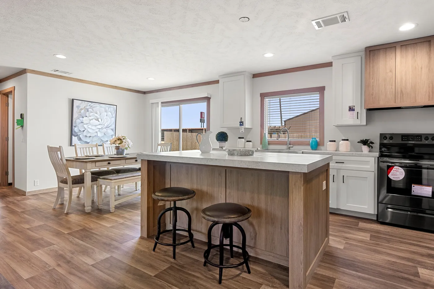 The LIZZIE Kitchen. This Manufactured Mobile Home features 3 bedrooms and 2 baths.