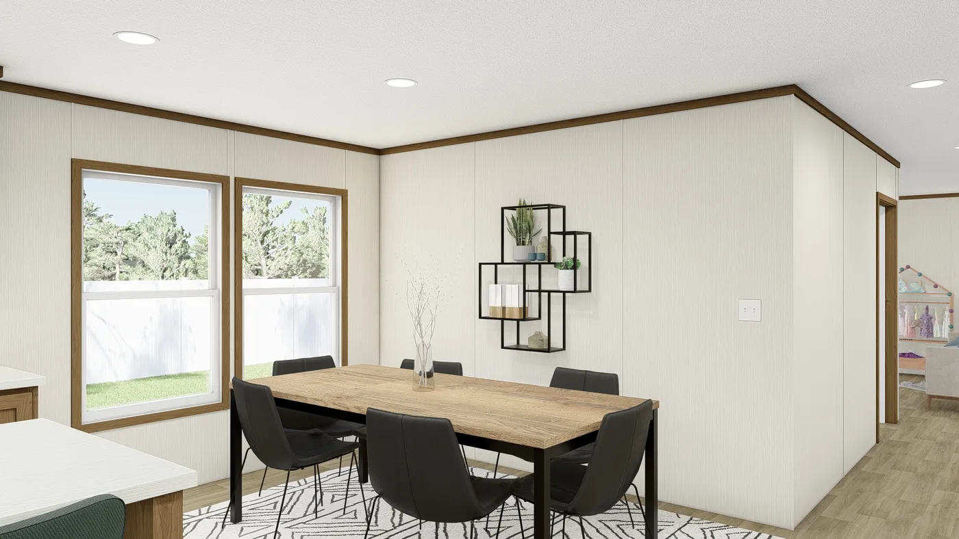 The THE EMPOWER Dining Area. This Manufactured Mobile Home features 4 bedrooms and 2 baths.