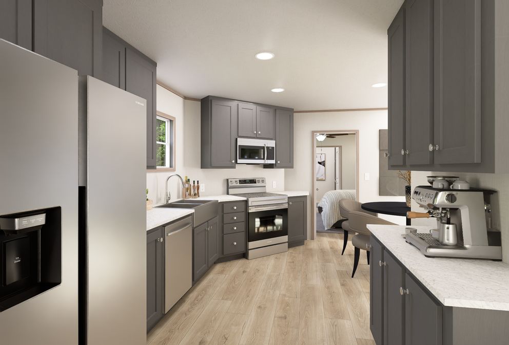 The ULTRA FLEX ANNIVERSARY PLUS Kitchen. This Manufactured Mobile Home features 3 bedrooms and 2 baths.