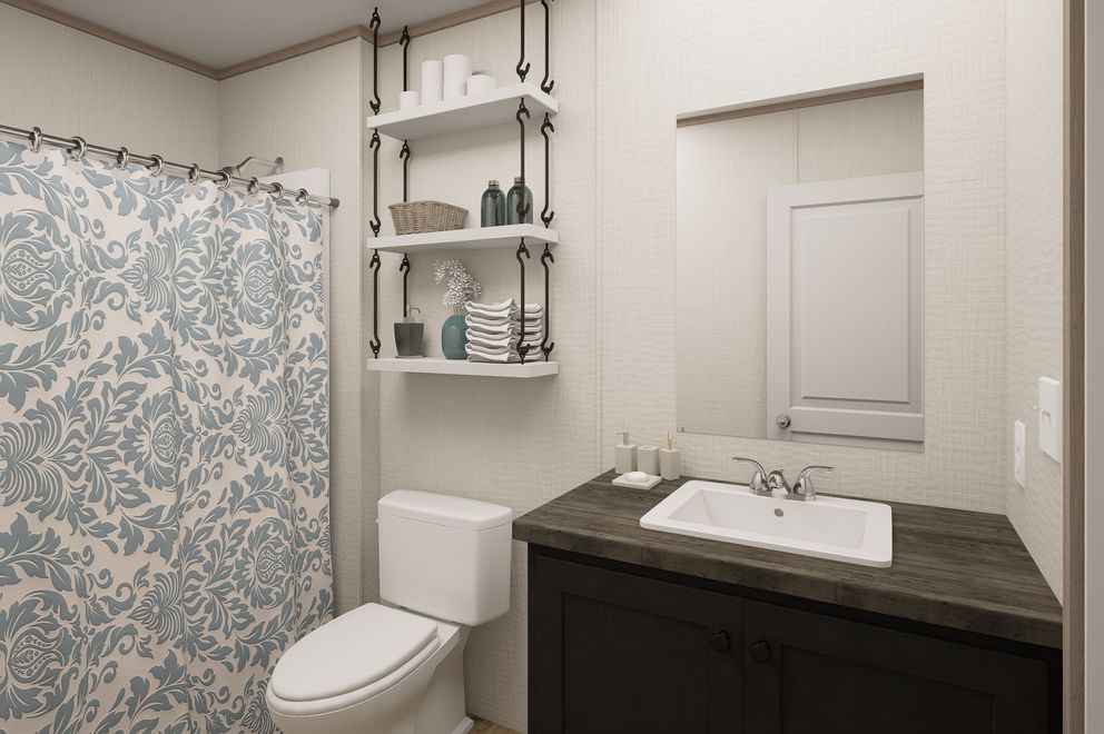 The ULTRA FLEX Guest Bathroom. This Manufactured Mobile Home features 4 bedrooms and 2 baths.
