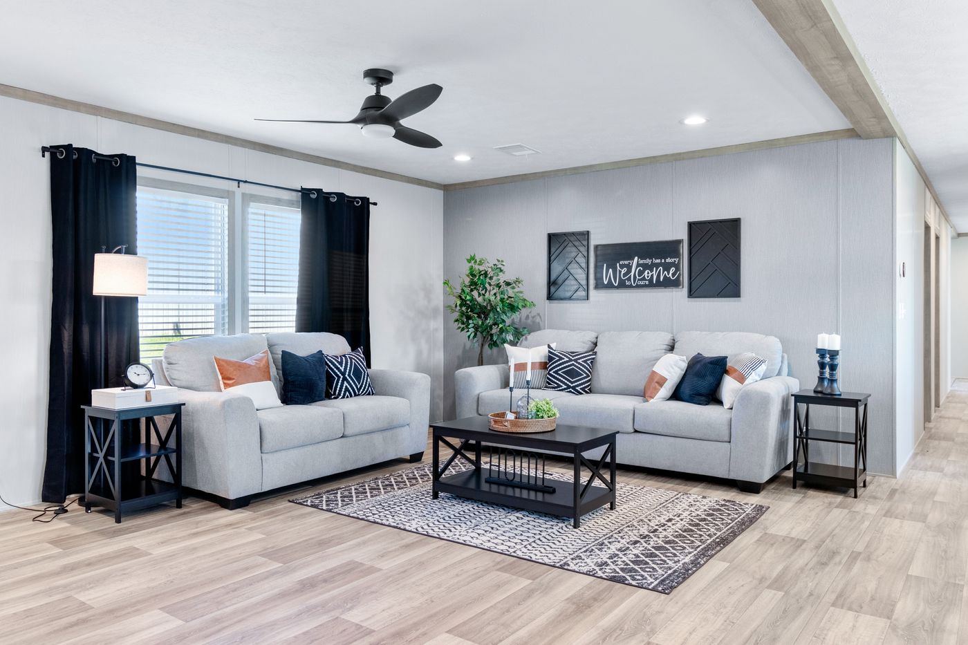 The ANATOLIA XL Living Room. This Manufactured Mobile Home features 3 bedrooms and 2 baths.