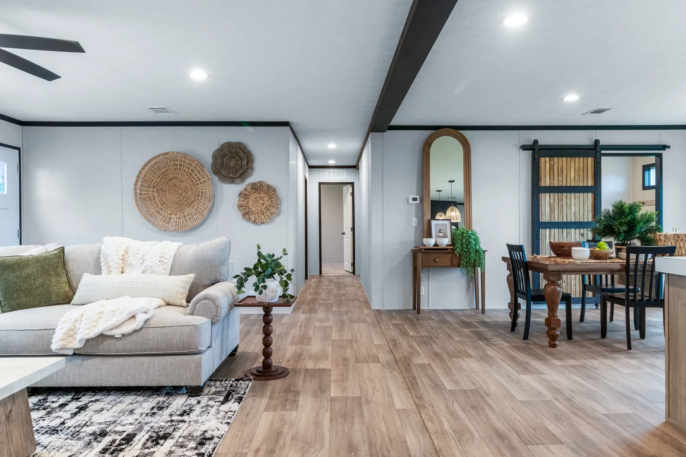 The ODYSSEY Living Room. This Manufactured Mobile Home features 4 bedrooms and 2 baths.
