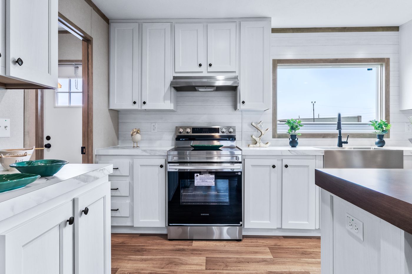The THE CHOICE Kitchen. This Manufactured Mobile Home features 4 bedrooms and 2 baths.