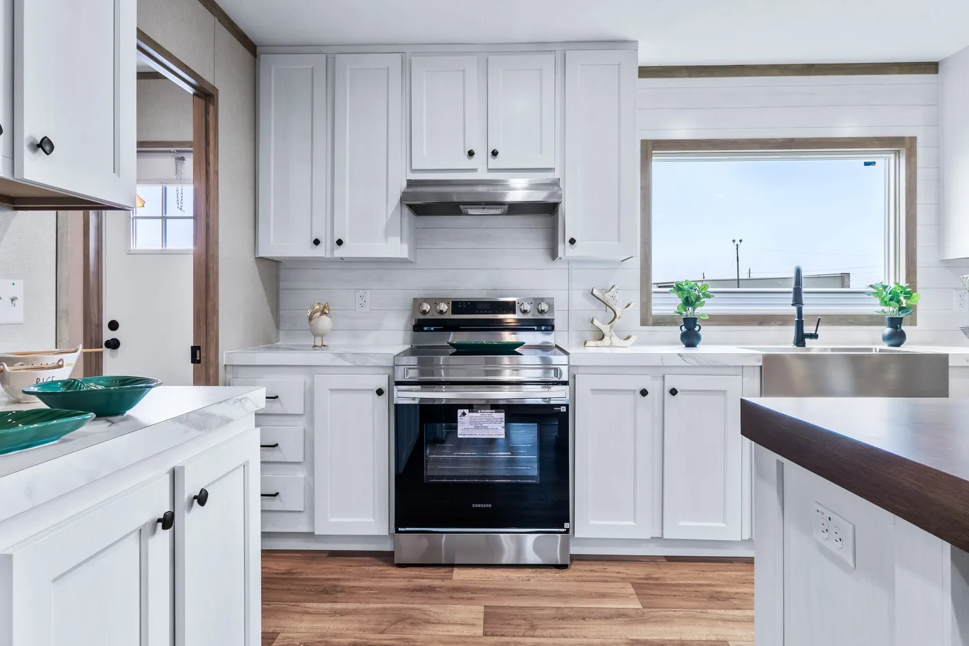 The THE CHOICE Kitchen. This Manufactured Mobile Home features 4 bedrooms and 2 baths.