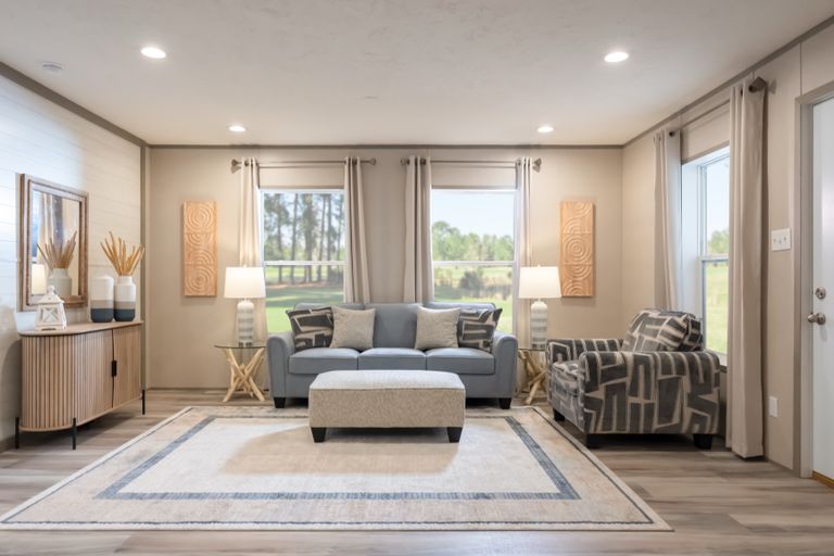 The TRADITION 48F Living Room. This Manufactured Mobile Home features 3 bedrooms and 2 baths.