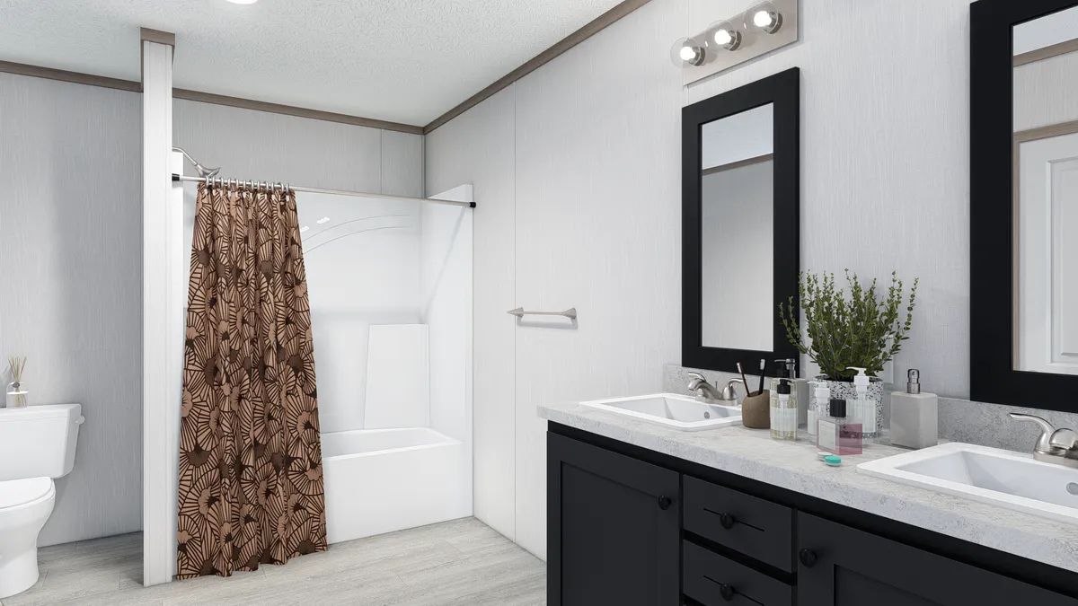 The 5628-E774P THE PULSE Primary Bathroom. This Manufactured Mobile Home features 3 bedrooms and 2 baths.