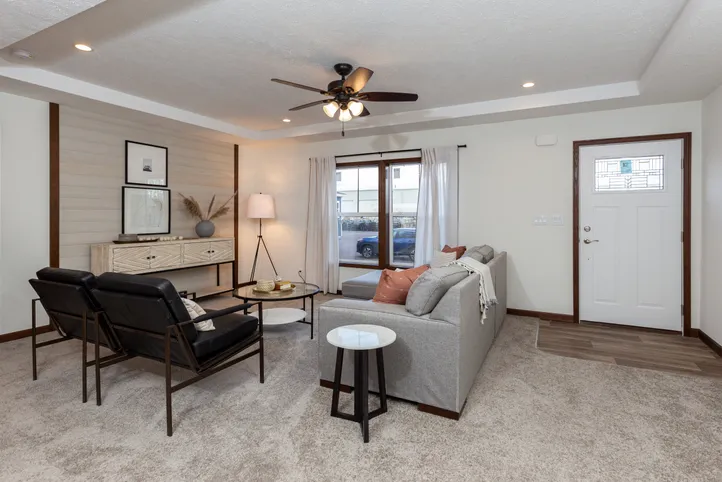 The LEGEND 86 Living Room. This Manufactured Mobile Home features 3 bedrooms and 2 baths.