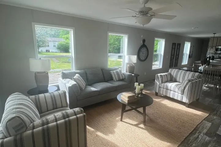 The JADE Living Room. This Manufactured Mobile Home features 2 bedrooms and 1 bath.