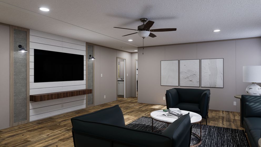 The MOUNTAIN BREEZE 3260 Living Room. This Manufactured Mobile Home features 3 bedrooms and 2 baths.