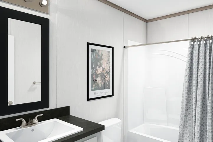 The 4828-E746 THE PULSE Guest Bathroom. This Manufactured Mobile Home features 3 bedrooms and 2 baths.