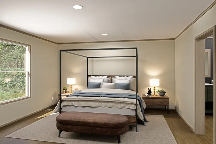The SUMMIT Primary Bedroom. This Manufactured Mobile Home features 4 bedrooms and 3 baths.