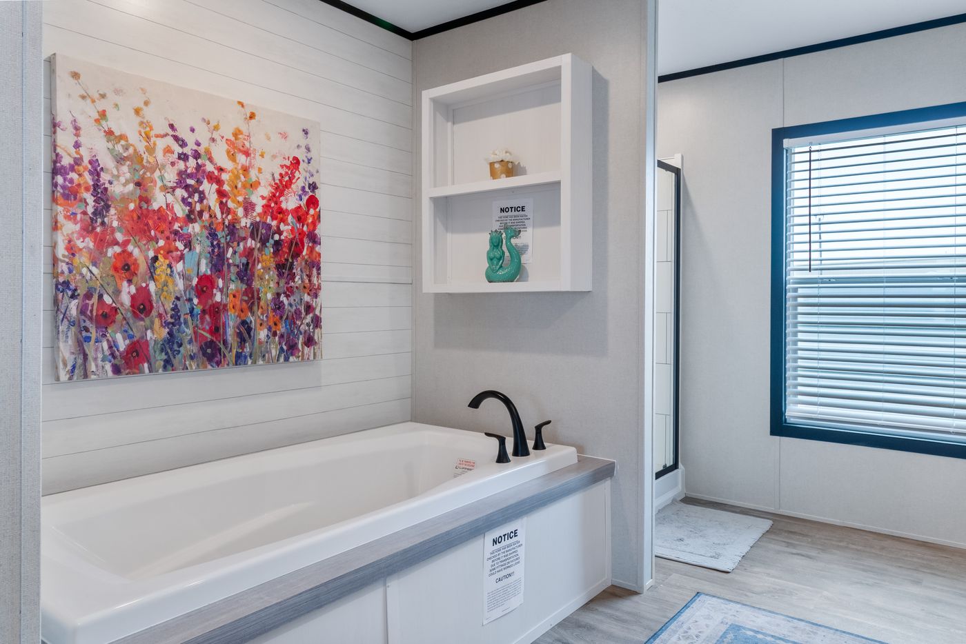 The HERCULES Primary Bathroom. This Manufactured Mobile Home features 4 bedrooms and 2 baths.