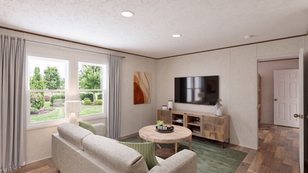 The SYCAMORE Den. This Manufactured Mobile Home features 4 bedrooms and 2 baths.