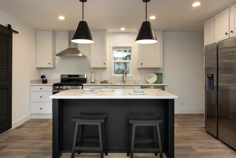 The HEY JUDE Kitchen. This Manufactured Mobile Home features 4 bedrooms and 2 baths.