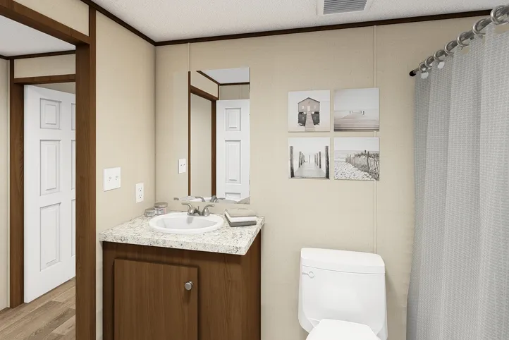 The MARVEL 4 Guest Bathroom. This Manufactured Mobile Home features 4 bedrooms and 2 baths.