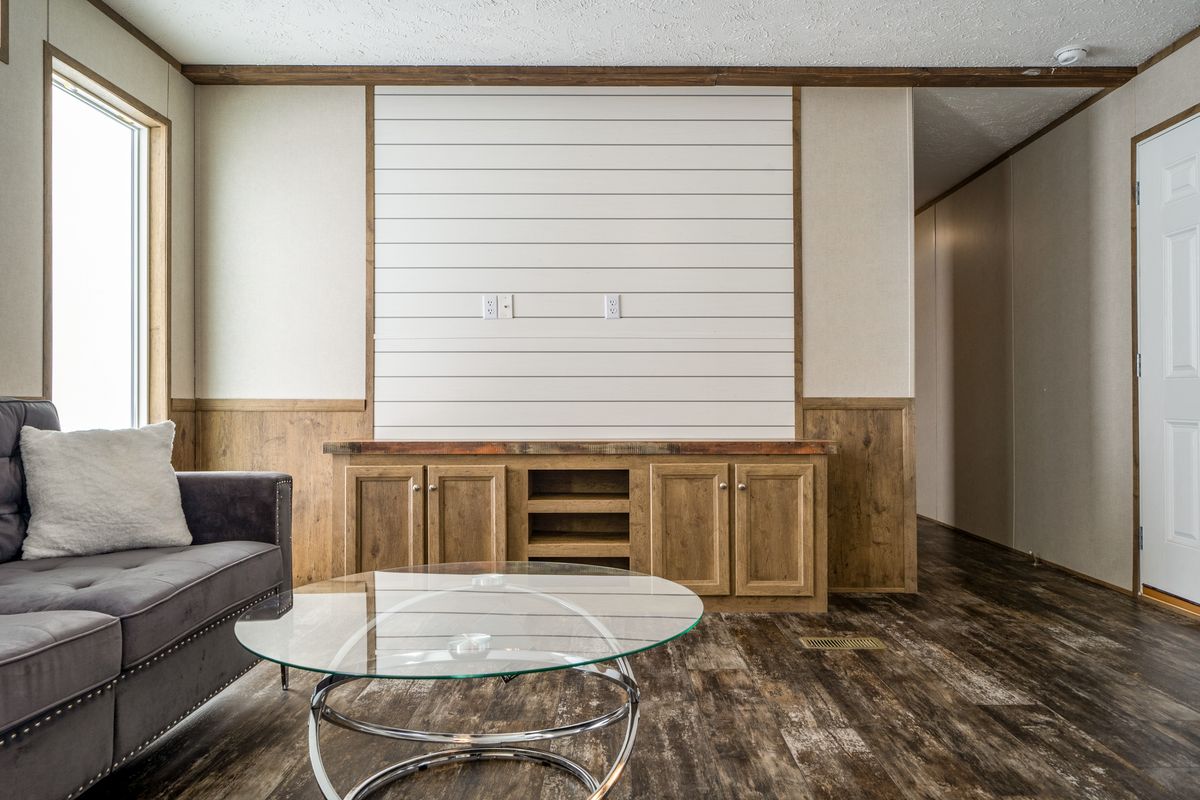 The ANNIVERSARY ENTERTAINER Exterior. This Manufactured Mobile Home features 3 bedrooms and 2 baths.