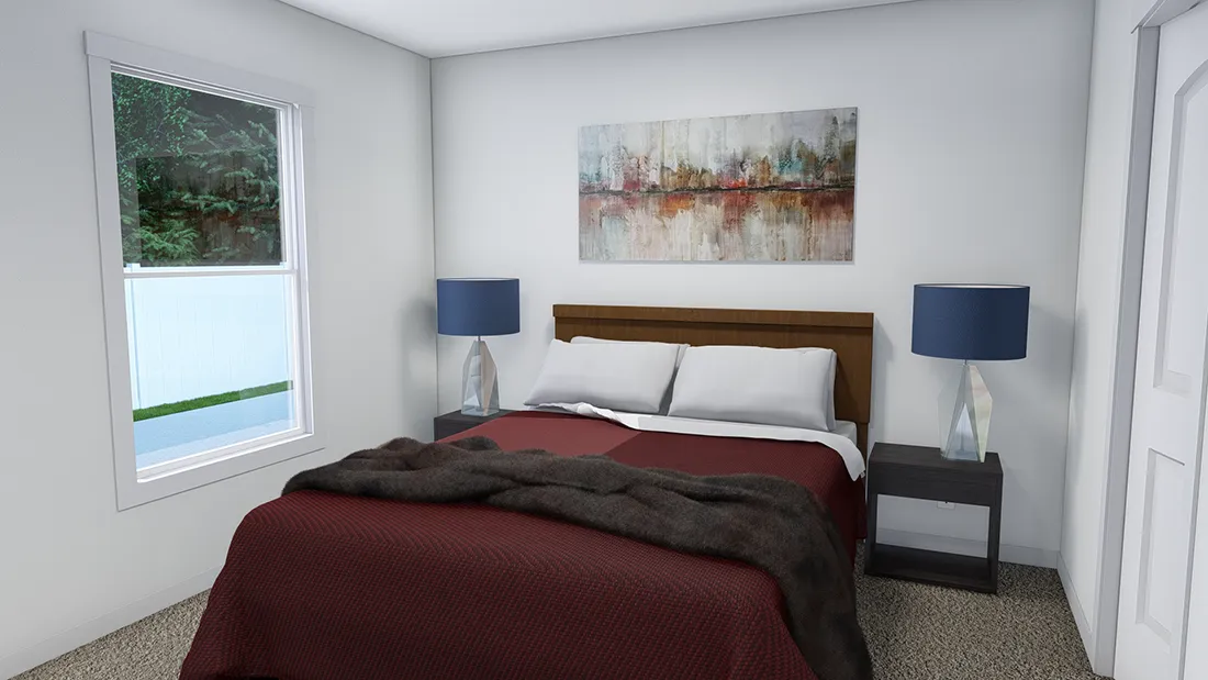 The SWEET DREAMS Primary Bedroom. This Manufactured Mobile Home features 3 bedrooms and 2 baths.