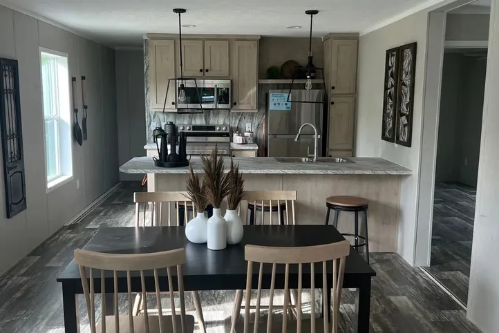 The JADE Living Room. This Manufactured Mobile Home features 2 bedrooms and 1 bath.